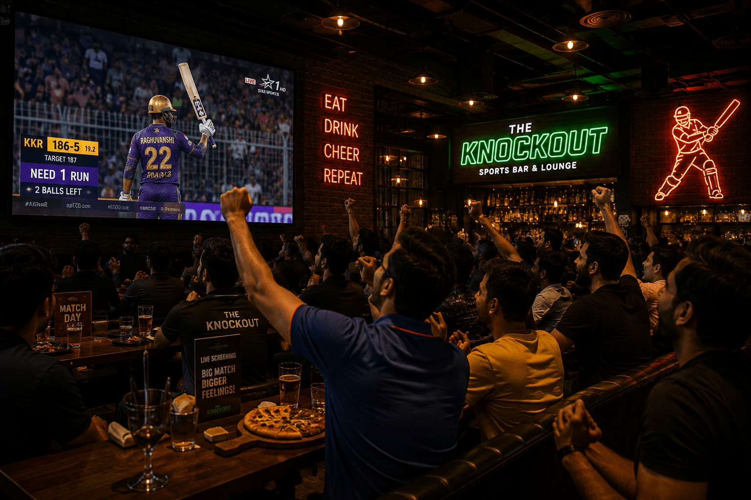Sports bar crowd watching a big match on screen